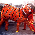Tiger puppet with performer