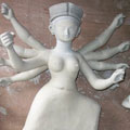 Clay Durga being hand shaped by Artisans